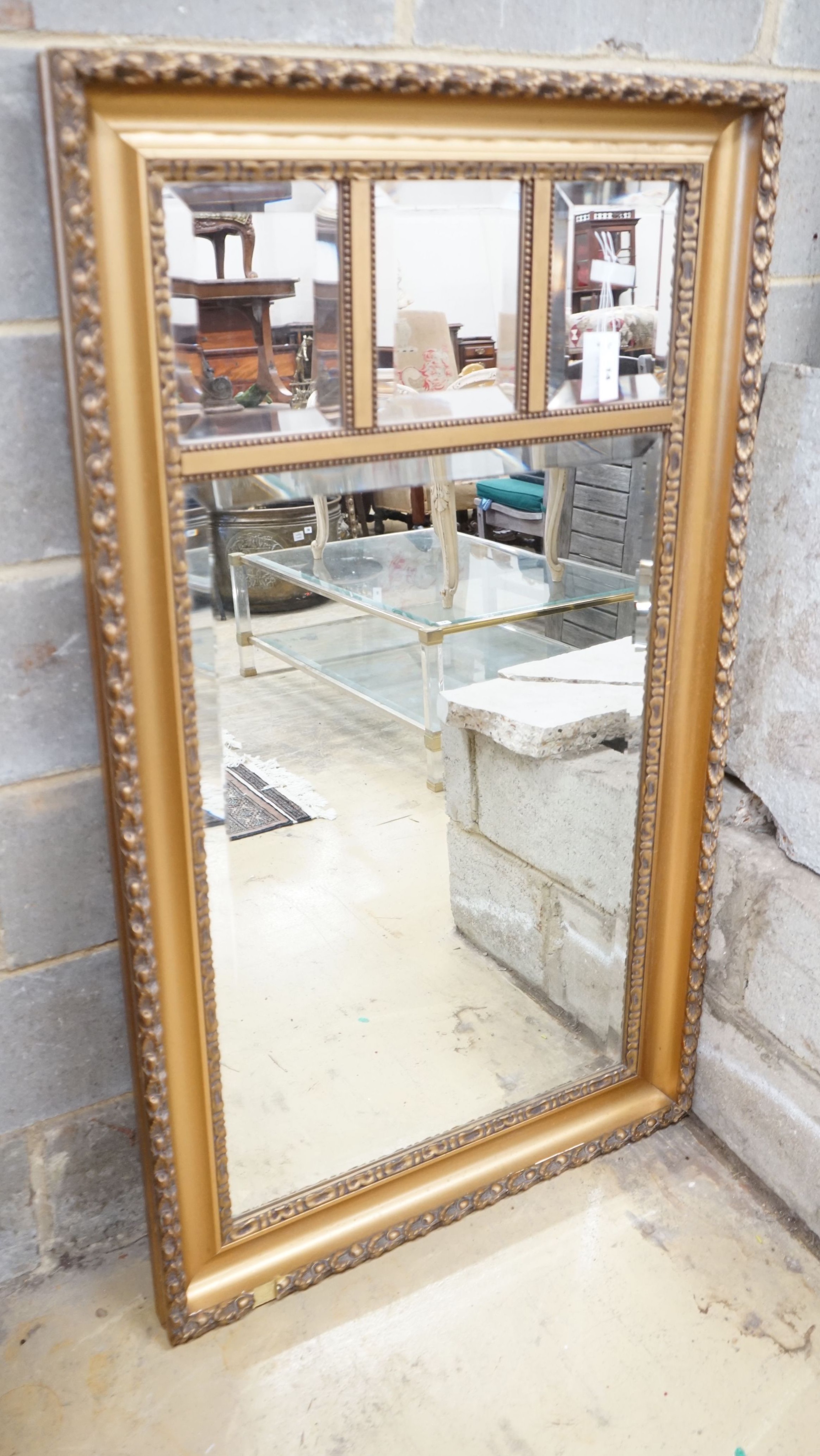 An early 20th century rectangular gilt frame four plate wall mirror, width 78cm, height 137cm